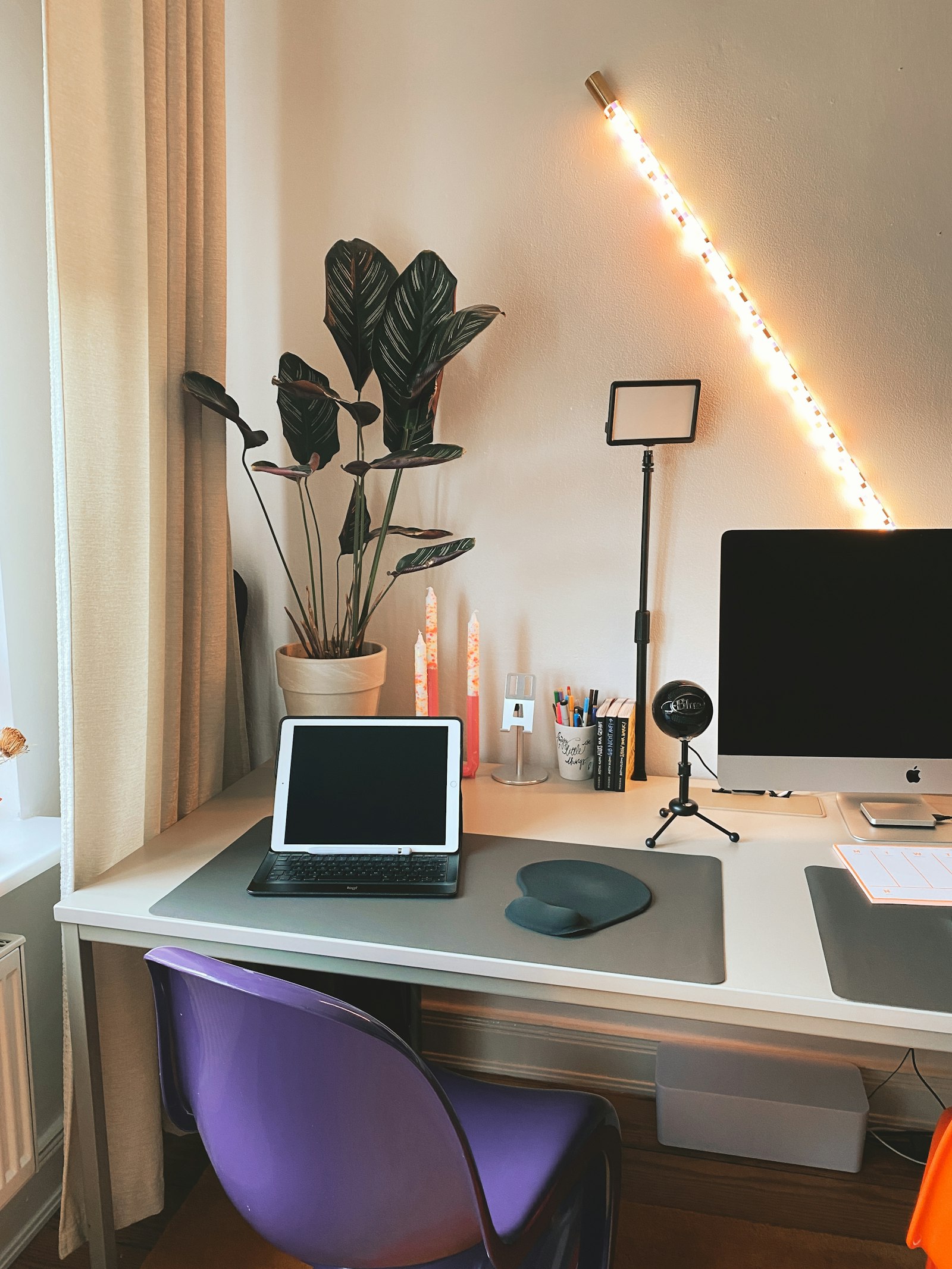 Standing desk converter on a table